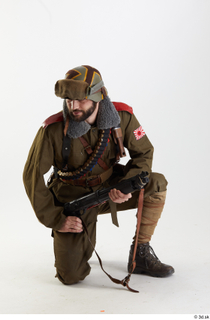 Photos Owen Reid WWI army holding gun kneeling whole body…